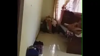 Dad teaches his daughter smoking in his house