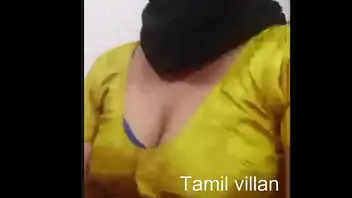 Deep cleavage showing in home aunty
